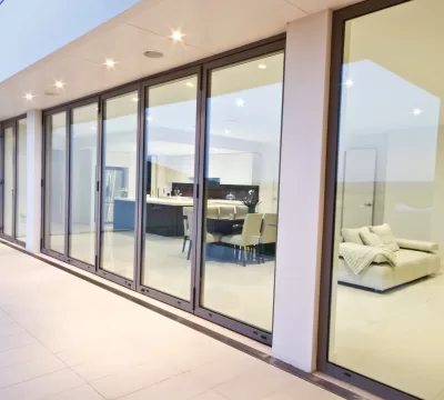Aluminium bifold doors opening onto a garden
